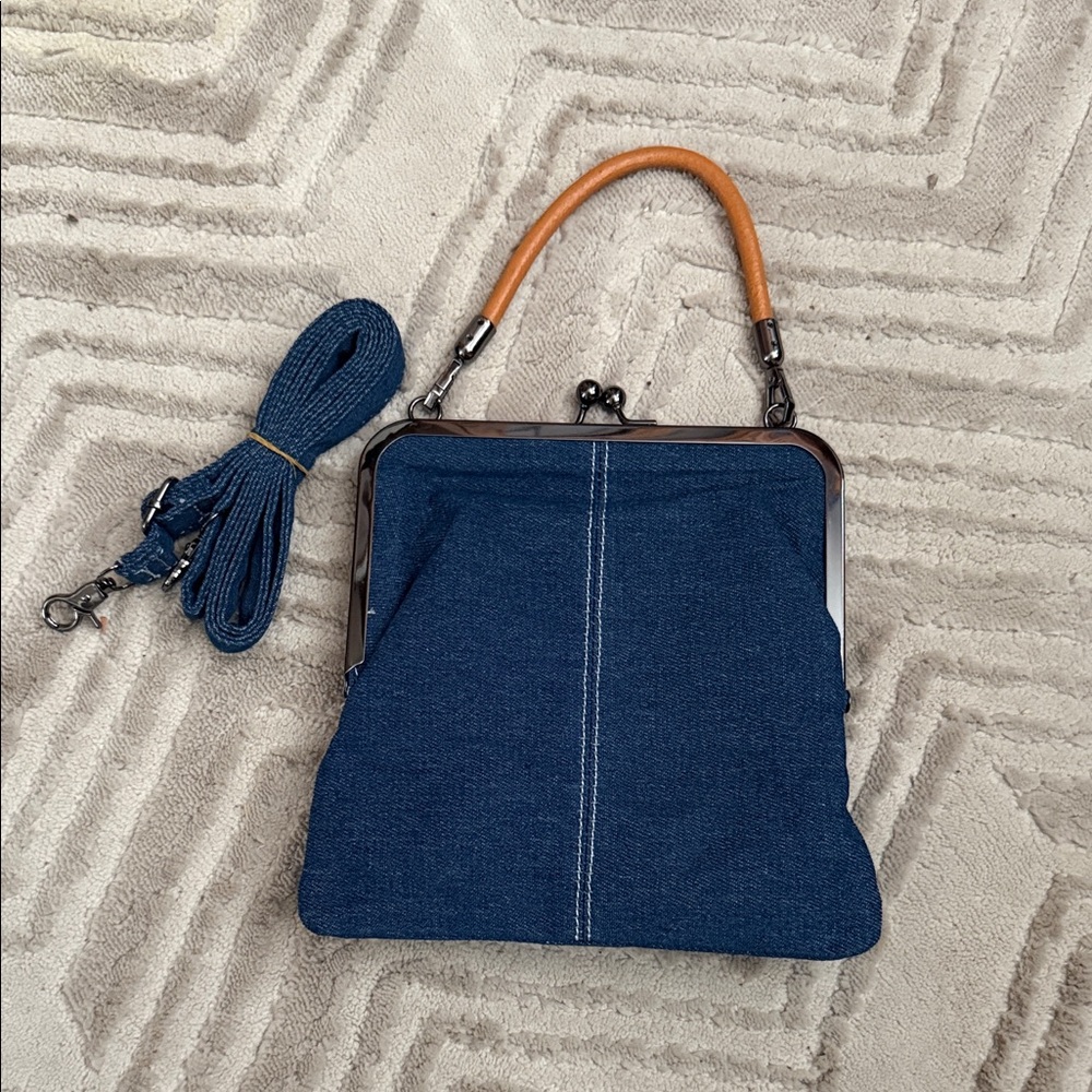 Stylish Blue Denim Handbag with Tan Handle